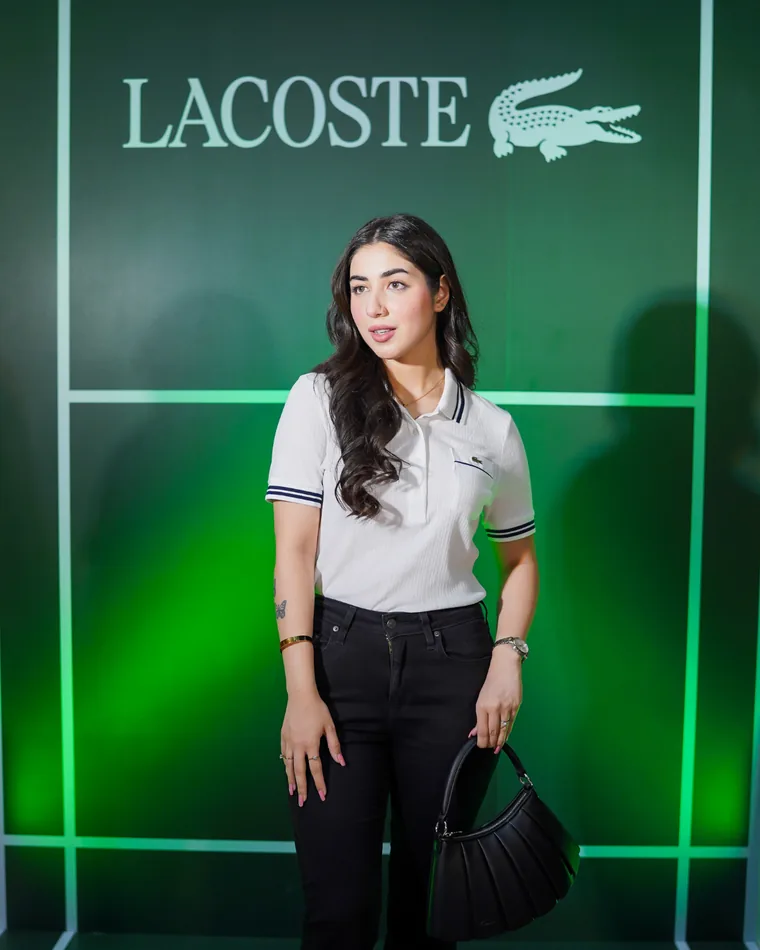 Creator at the Lacoste launch backdrop